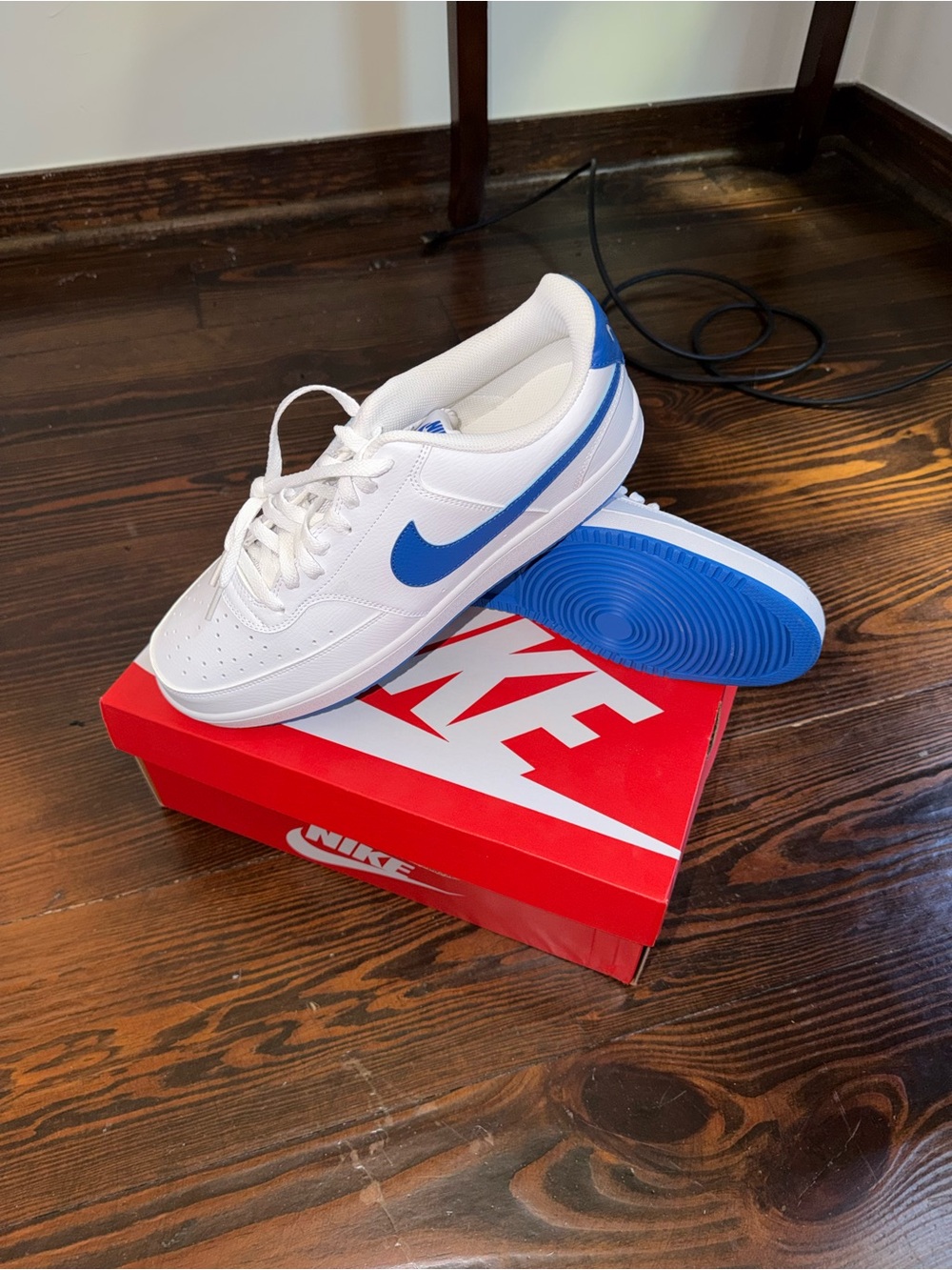 Nike Court Vision White Low-Top Sneakers with Blue Swoosh